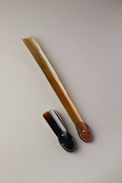 Flat shoehorn with cowhide handle