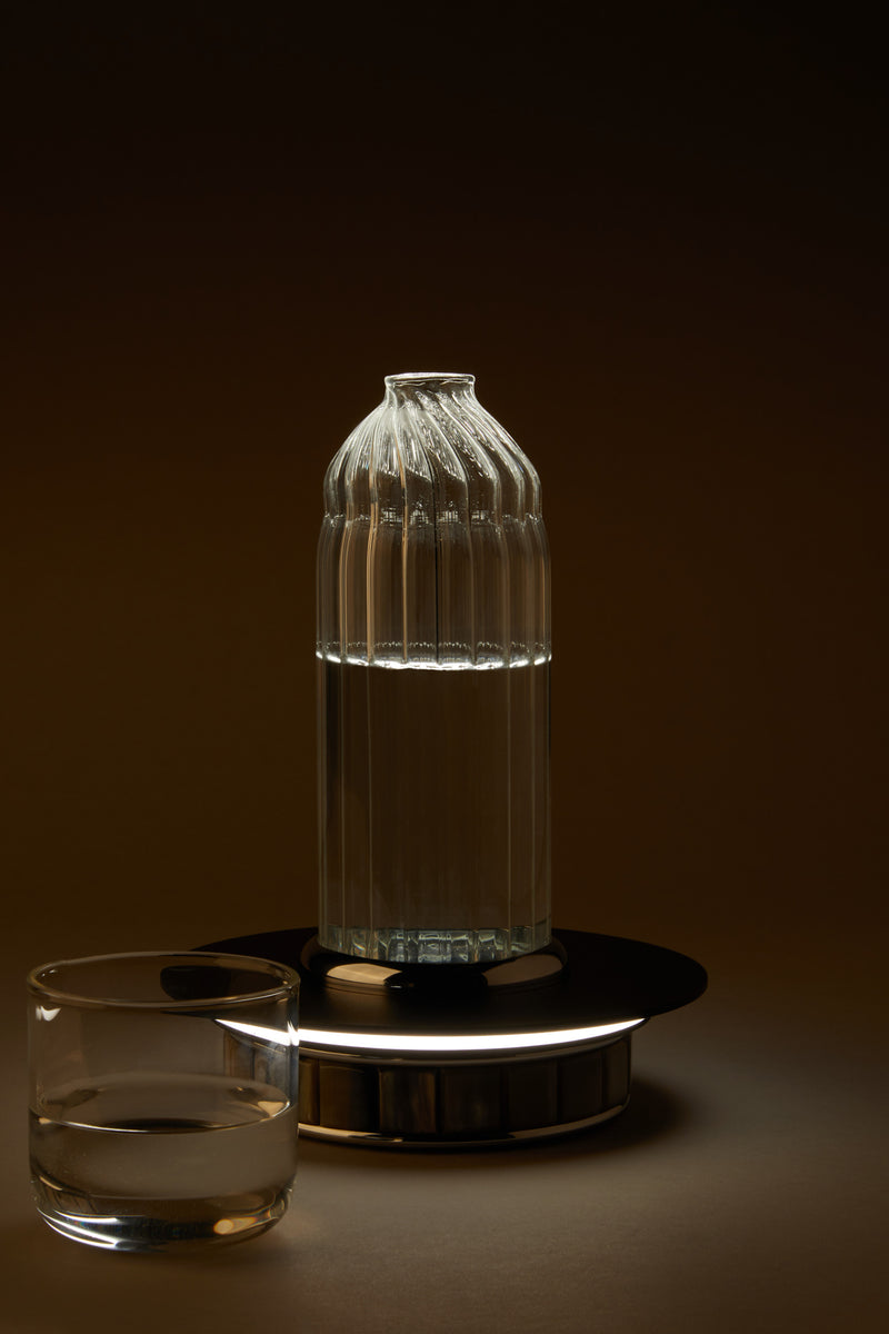 Night lamp with bottle and tumbler in zebu