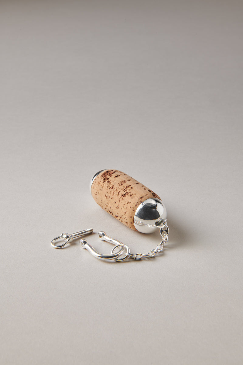 Portachiavi Zancan in argento con bussola nera e spinelli neri Portachiavi Zancan in argento con bussola nera e spinelli neri
