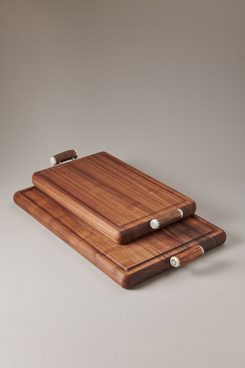 Cutting board with handles